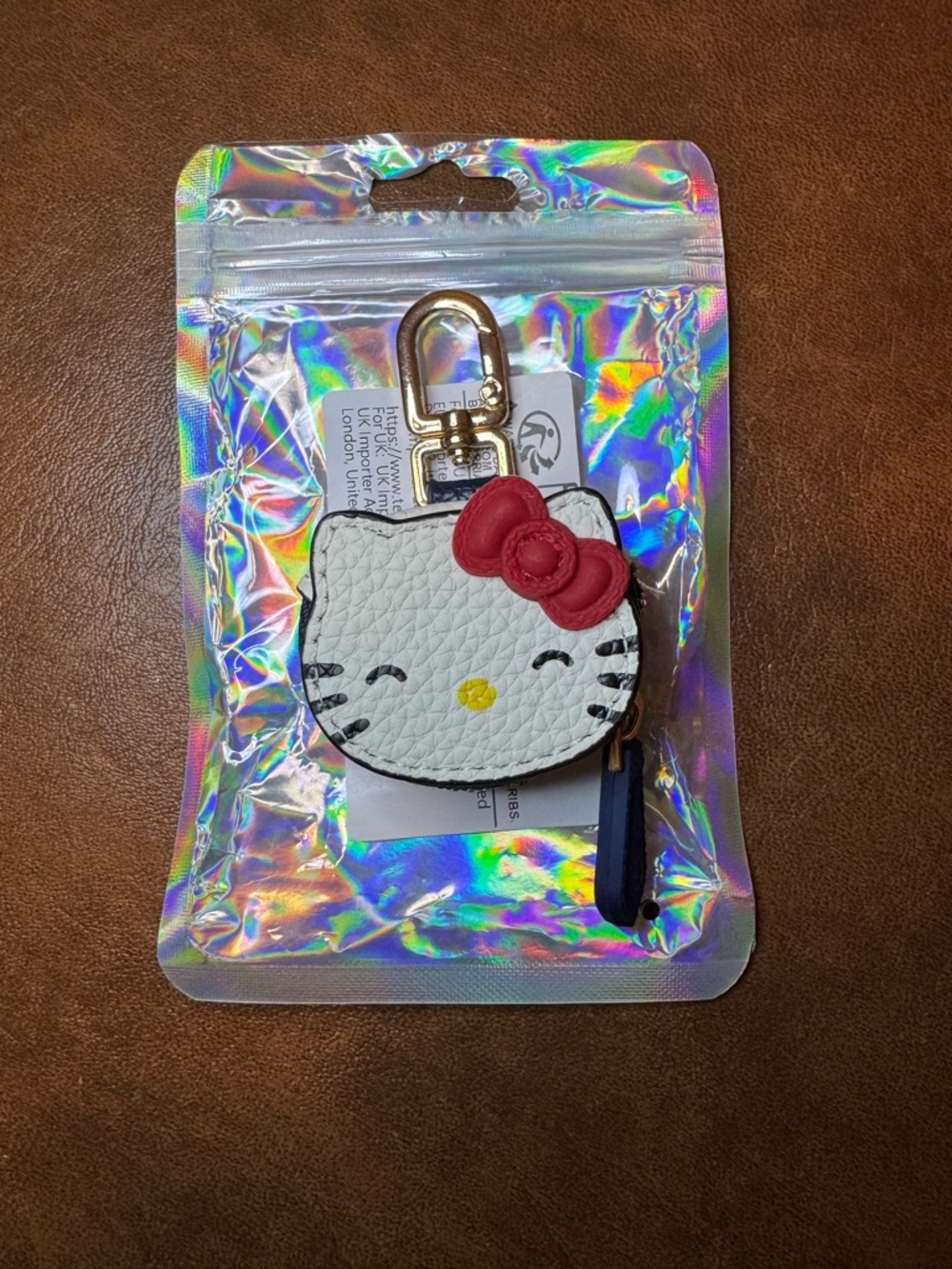 NWT Hello Kitty White Faux Leather Bag Charm Pouch with Red Bow